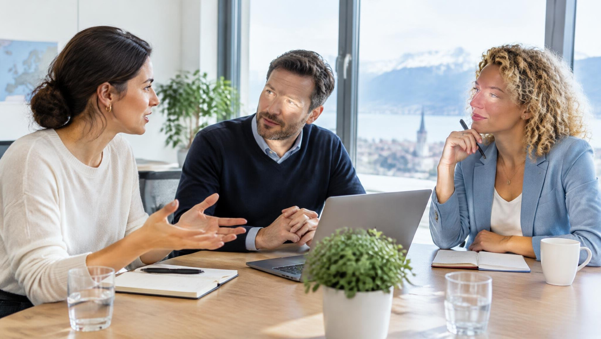Professionals discussing business communication strategies in a bright meeting room